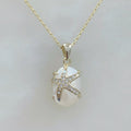 Bonita Cadena con Dije en Madre Perla con Estrella de Mar en Plata Dorada con circonias 35-PCE-L15