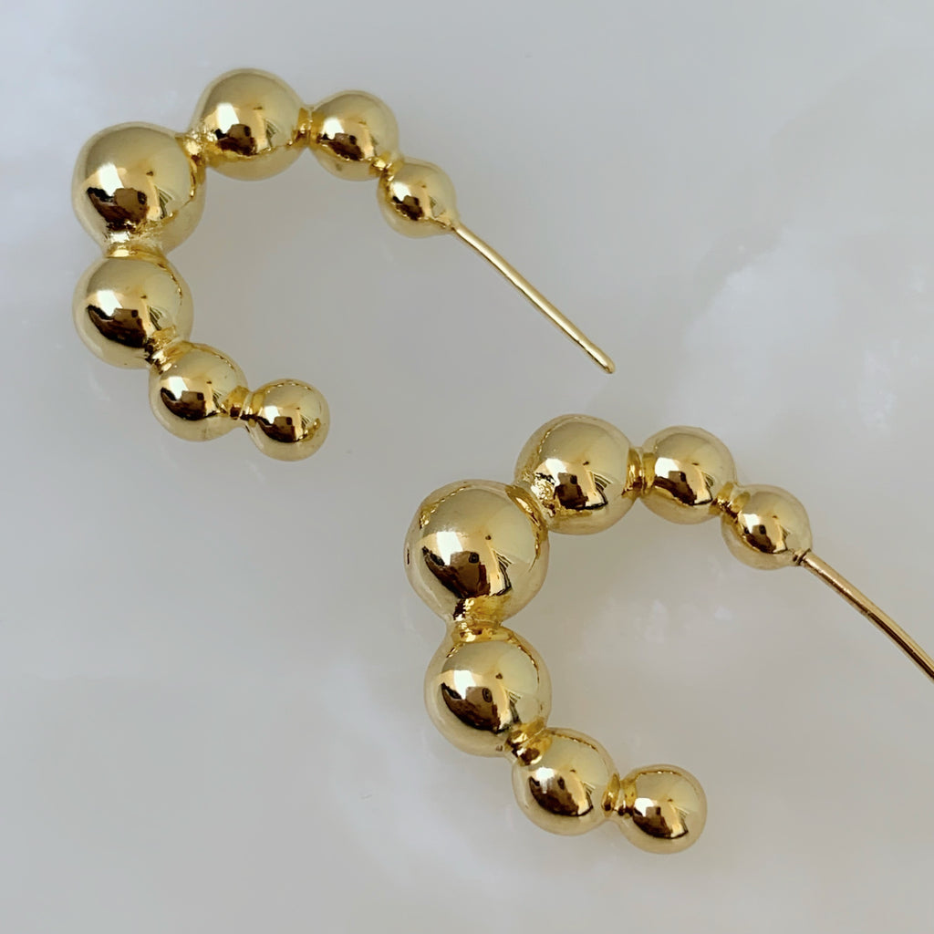 Brilla con Estilo Hoops Earrings en Oro Laminado 14-ARL-135