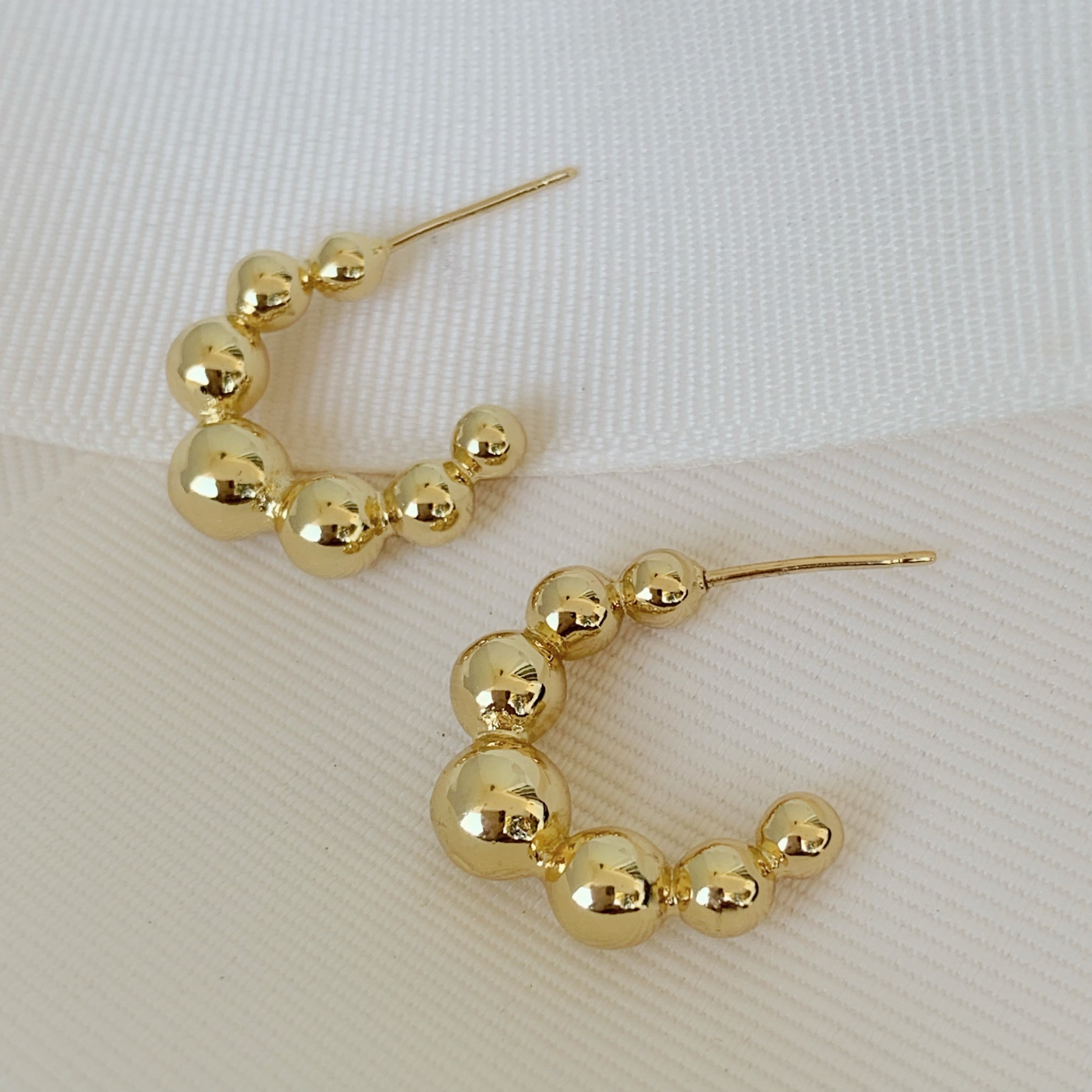 Brilla con Estilo Hoops Earrings en Oro Laminado 14-ARL-135