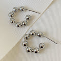 Brilla con Estilo Hoops Earrings en Oro Laminado 13-ARL-135