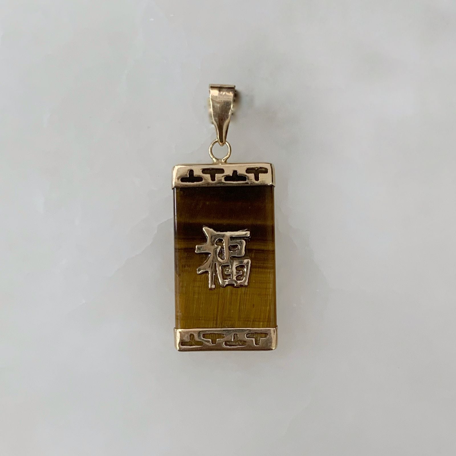 Dije Símbolo Fu Ojo de Tigre Oro Amarillo 14K DI-14-02-L59